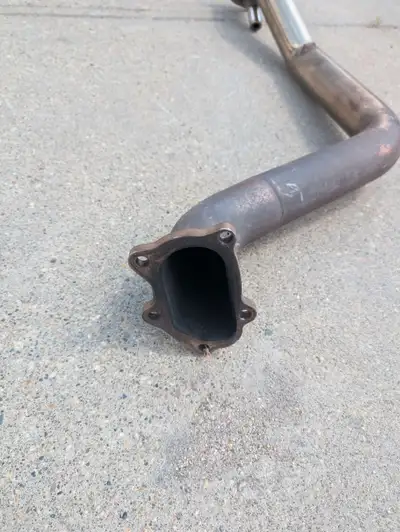 Injen Catless stainless steel Downpipe. Cleaning up garage and getting rid of spare parts. Looks to...
