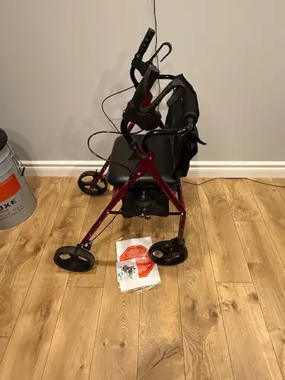 Roller walker in excellent condition. Never been used outside. It has a comfortable seat with back r...