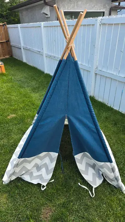 This stylish blue teepee tent is the perfect hideaway for your little ones, featuring a durable canv...