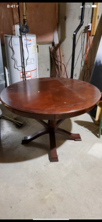 Solid wood table 48” in diameter 