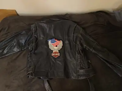 Men's Harley Davidson Biker jacket. Labled as size 48 which would be large or extra large. Feel free...