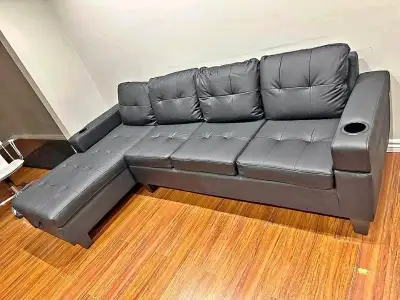 NEVER USED! Leather sectional couch with cupholders !, View more