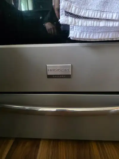 Frigidaire gallary gas stove . Slight cosmetic damage from heat but works great. 150obo