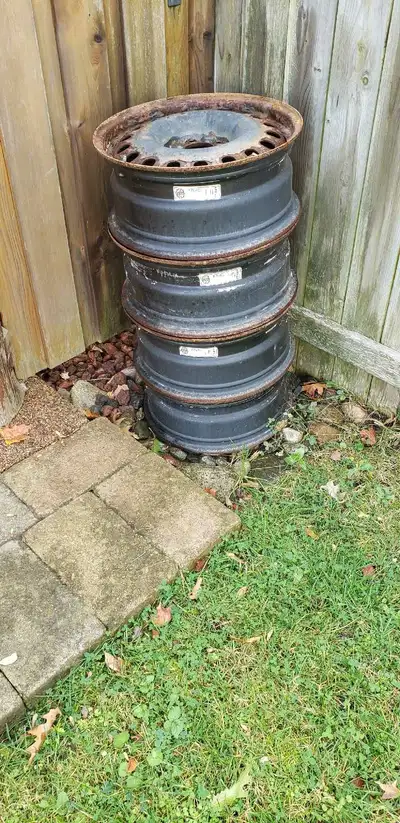 17 inch honda steel rims. Rusted but hold air and valve stems included .