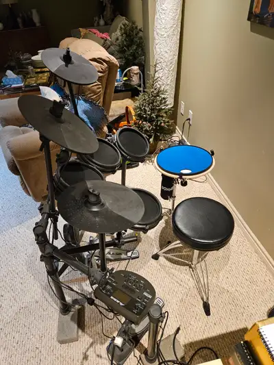 Alesis NITRO Electronic Drum Kit with Throne, View more