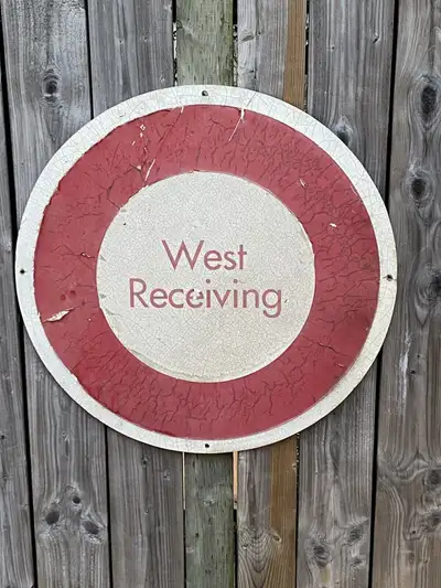 Nice steel advertising sign. It reads “West Receiving”. Flaking on the front. Nice display piece. Me...