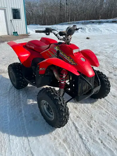 1999 Polaris 400 2-stroke 2wheel drive. New engine aftermarket exhaust quad has never seen mud under...