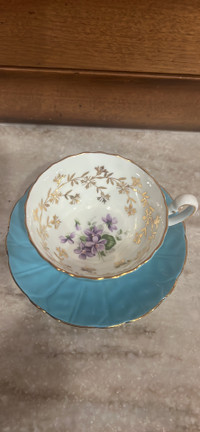 Vintage Ainsley teacup and saucer turquoise with Purple flowers.