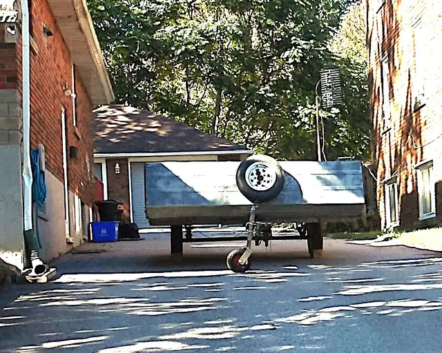 Am in NEED of ILLEGAL TRAILER REMOVED FROM MY DRIVEWAY!