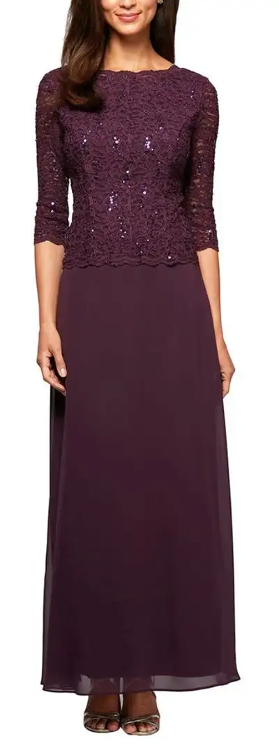 A sequin lace and silky chiffon A-line gown with shimmering bodice. 3/4 length sleeves. New (never w...