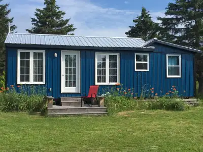 Fully renovated waterview cottage on full-acre on Little Sands Wharf Road, Prince Edward Island. A d...
