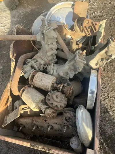 Flat head for parts 4 intakes , exhaust manifolds, 2 sets of heads starters and alternators , and a...