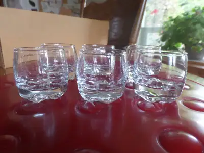 6 squat shot glasses $5 5 shot glasses $5 3 covered glass candy jars $10 2 raised glass tulip bowls...