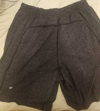 2 pairs of lululemon men's shorts $15 in total read description 