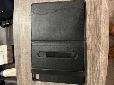 LIke new Finte 11" Ipad case. Only used 2 weeks. Black in colour. New $25 asking $10.