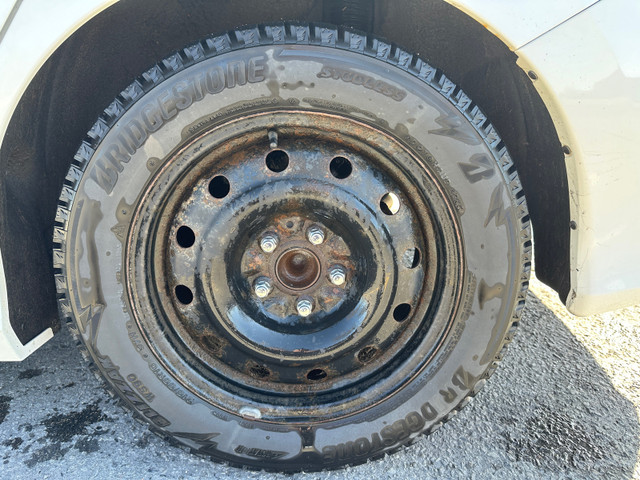 4 winter tires on rims 215/55/R16 Bridgestone blizzak in Tires & Rims in Ottawa