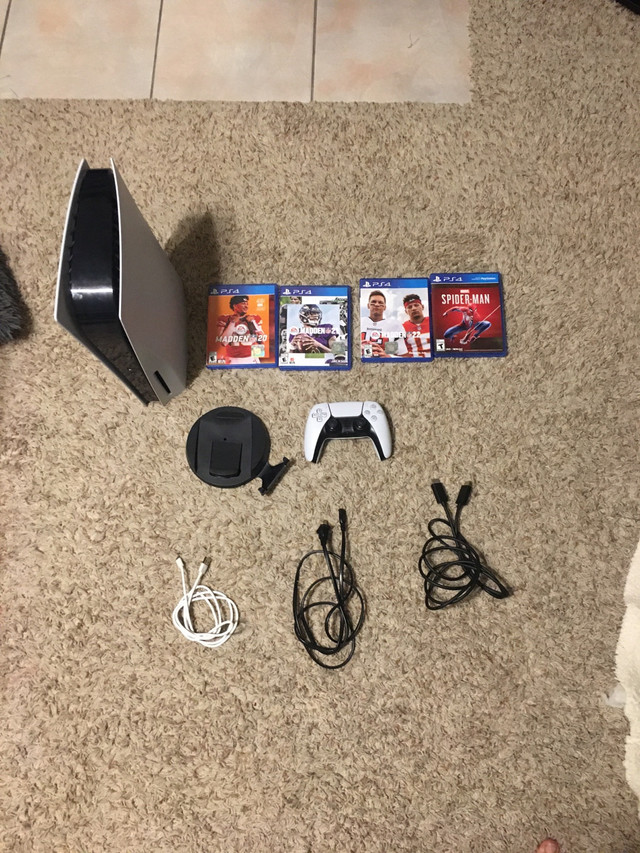 PS5 with controller and 4 games with all necessary cables  in Sony Playstation 4 in Calgary