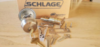 New Dead bolt (Schlage) nickel / stainless steel finish.