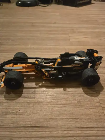 Get ready to race with this Lego Technic racer! This model features realistic details and a sleek de...