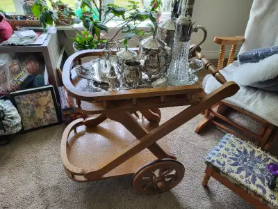 I am selling my Mom's Silver Tea Set, complete with the solid wood cart. I love it but it's time for...