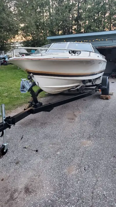 Doral 20' boat for sale with ez loader trailer. Trailer is in mint condition new lights. Boat body i...