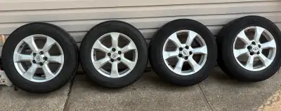 Michelin Defender All Season Tires 225/65 R17 Good life remaining at 8/32” depth Mounted on aluminum...
