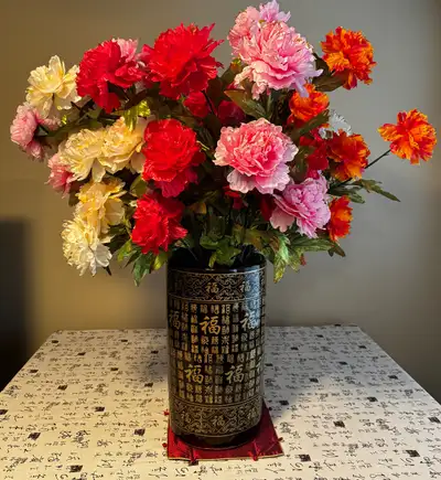 Thirty three long stern peonies with a classic fortune blessing vase. All petal are golden edged to...