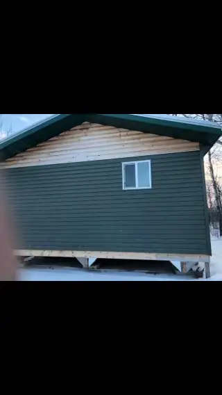 built in 2017 insulated metal roof comes with woodstove and insulated skirting sheeted with plywood...