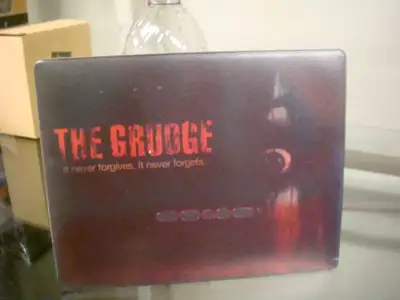 The Grudge Mouse Pad, View more