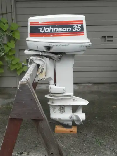 35 HP JOHNSON SHORT SHAFT WITH CONTROLS, LOW HOURS, NEW PLUGS AND BOTTOM OIL, ELECTRIC START.