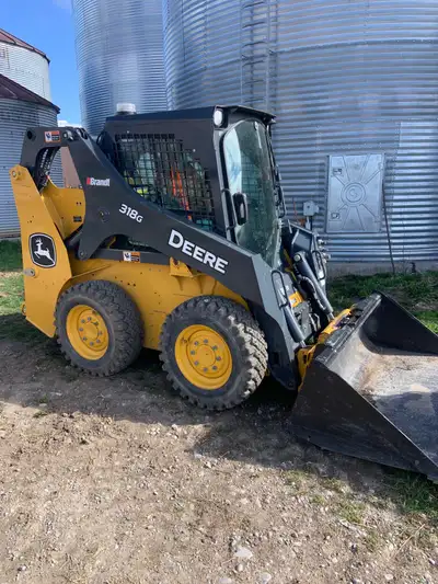 2023 John Deere 318G Skid Steer 185 Hours Cab Heat, AC , Radio, heated seat, hydraulic quick connect...