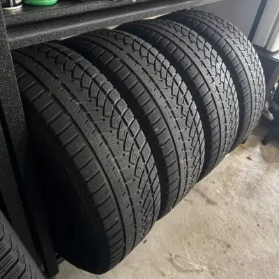I'm selling a set of four used winter tires, size 235/65R17, ready to tackle snowy roads with their...