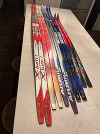 5 sets of cross country skis 