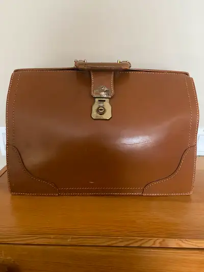 I am selling this Vintage Leather Briefcase for $30. It is in fairly good condition. It does not com...