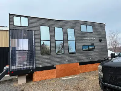 2024 Cherokee Timberwolf Mini Loft trailer (tiny home). Comes with two lofts (electric fireplace in...