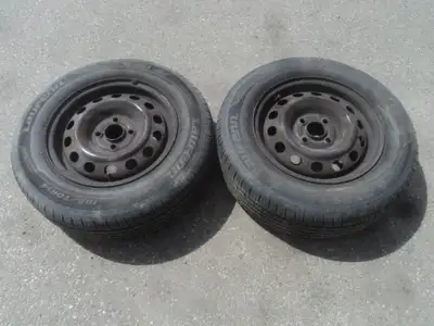 2 Laufenn all season tires with steel rims are for sale. Tires are 185/70/14. Rims are 4 holes, 4 in...