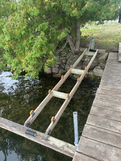Boat ramp built with the multinautic wheel kit, has a winch with cables. In the photo it has our 14’...