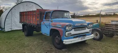 1958 grain truck, complete, including key turns over. Two-speed rear and PTO driven hydraulic system...