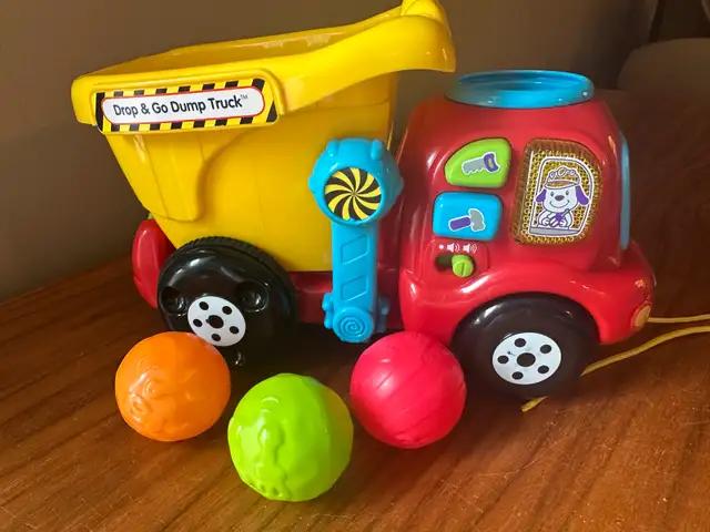 VTech Drop & Go Dump Truck - drop the rocks through the hole 63735877243521120