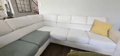 Sectional Air leather white/ivory sofa Wear and tear in the pictures Size- 112" x 88" There is defin...