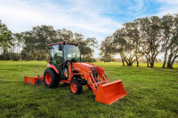 Kubota Tractor backhoe digging landscaping for hire