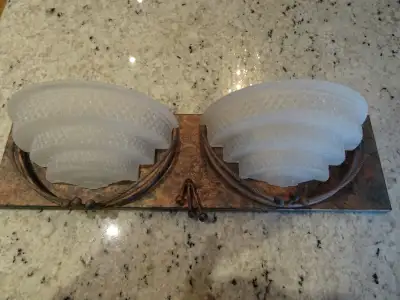 Wall mount plaque with two lights Vintage. Rare find. measuring 16"L x 4.25"W. New never used. Pleas...