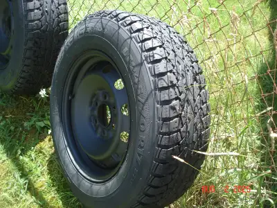 Four Ford 17 inch 6 lug wheels and winter tires. Tires are LT 245 / 70 / R17 Champio Ice Pros. Tread...