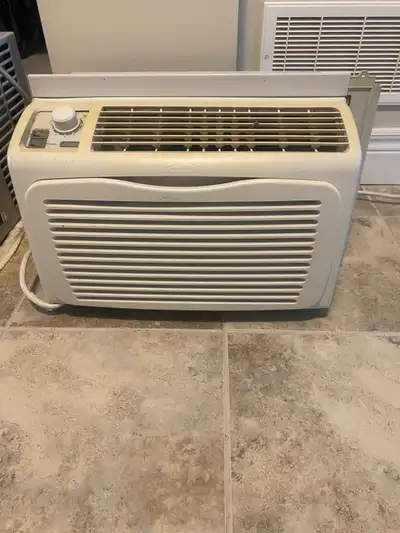 Kenmore air conditioning 5500 BTU with sleeve good condition, View more