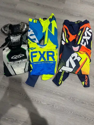Selling Two very new sets of men’s riding gear zero tears or rips in the sets Blue And Yellow: Pants...