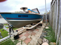 Lund Acadian 14’ + 15 hp Evinrude and trailer 