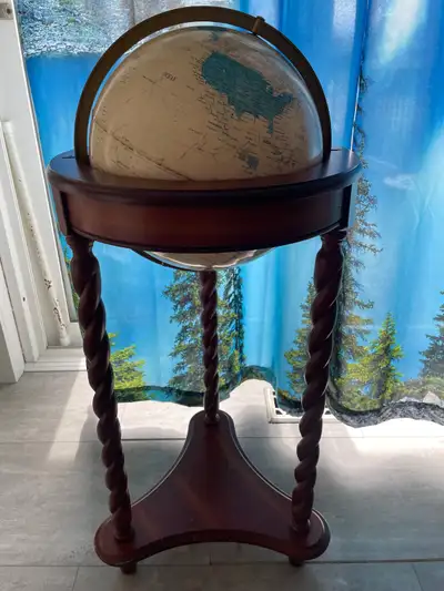 Spinning world globe on wooden maple stand Local delivery to Belleville or Picton possible