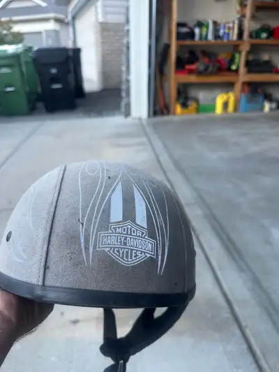 Older Harley Davidson helmet for sale, size large. Sold my bike. Also have a couple of large Harley...