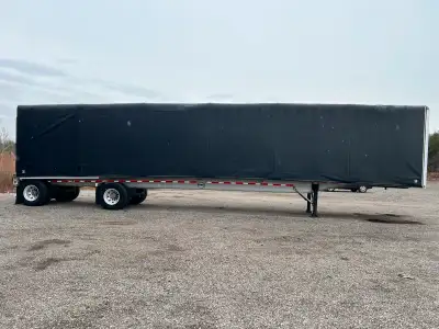 Key Details: - Year: 2017 - Type: Flatbed - Length: 48 feet - Condition: Fully functional, but tires...