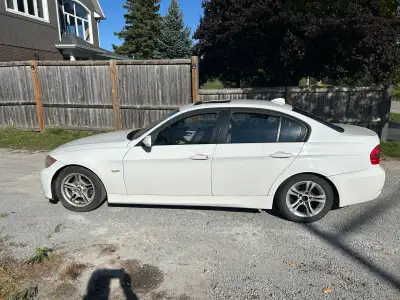 White with white leather interior and beautiful trims, Just did oil change, transmission oil, rear s...